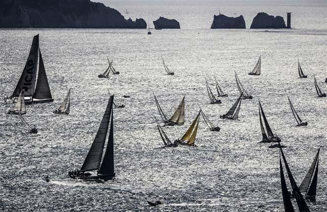 The Rolex Fastnet Race 2013 record breaking fleet passing by The Needles - 2013 Rolex Fastnet Race &copy;  Rolex/ Kurt Arrigo http://www.regattanews.com